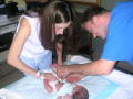 mom and dad, first diaper change